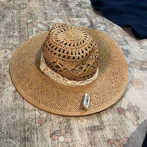 Straw hat never worn, tag included